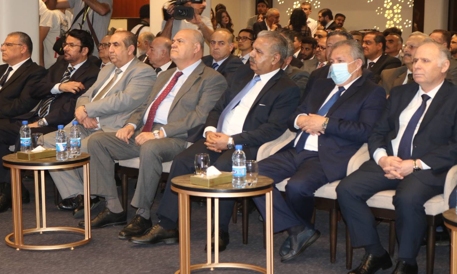 وزراء في حكومة النظام السوري في مؤتمر "الاستثمار في الكهرباء والطاقات المتجددة) في 15 من أيار 2022 (سانا)