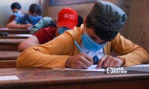 طالب يقدم امتحان التعليم الأساسي في مدينة إدلب_ حزيران 2022 (عنب بلدي/ أنس الخولي)