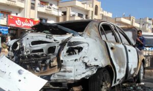 آثار انفجار عبوة ناسفة بسيارة عند دوار خربة غزالة على مدخل مدينة درعا الشمالي الشرقي- 30 تموز 2022 (سانا)
