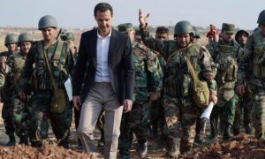 رئيس النظام السوري بشار الأسد يزور وحدات عسكرية في محافظة إدلب شمال غربي سوريا- 23 من تشرين الأول 2019 (سانا)