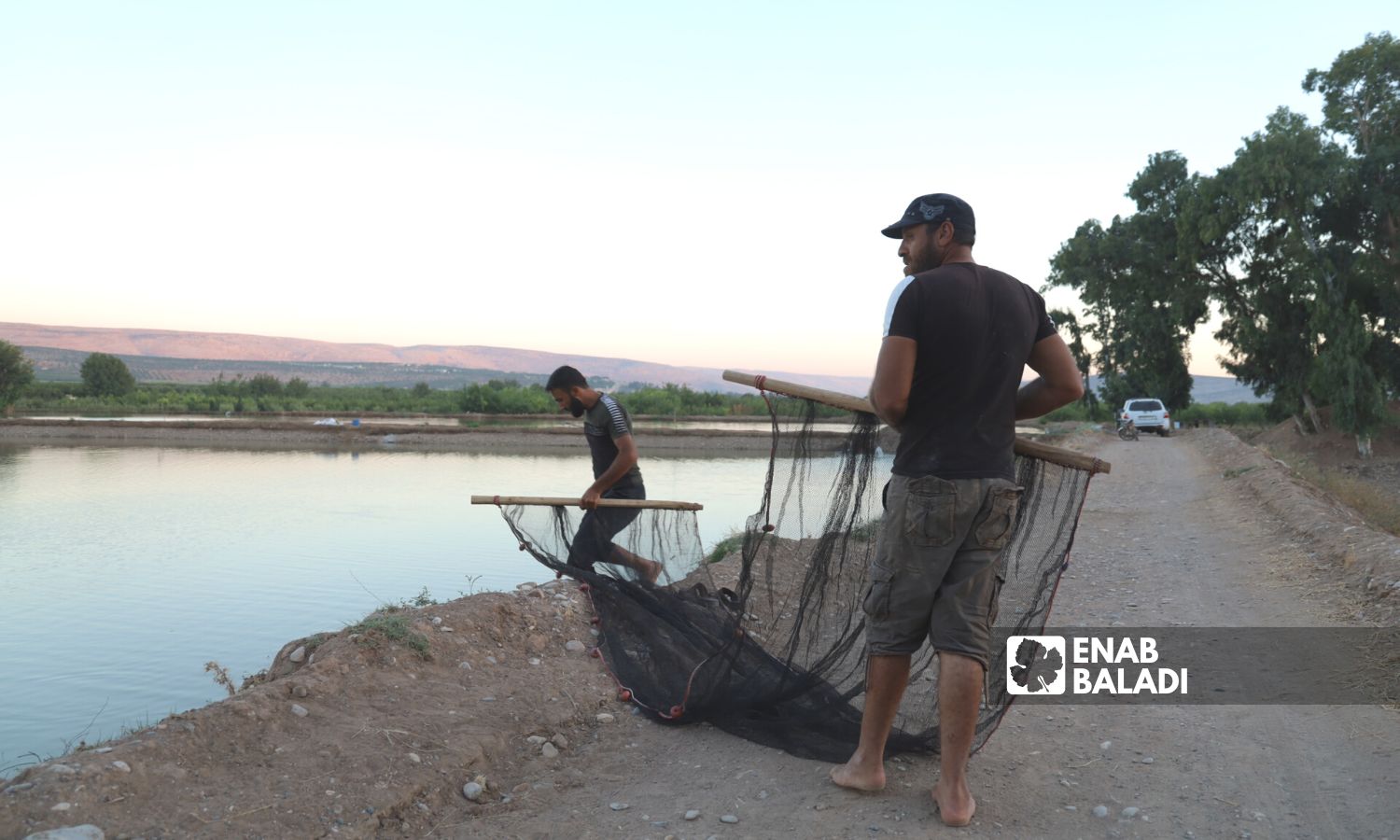مزرعة لتربية الأسماك في منطقة عفرين بريف حلب الشمالي - 11 أيلول 2022 (عنب بلدي / أمير خربطلي)