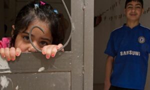 طفلان سوريان لاجئان في الأردن-26 من شباط 2018 (يونسيف)
