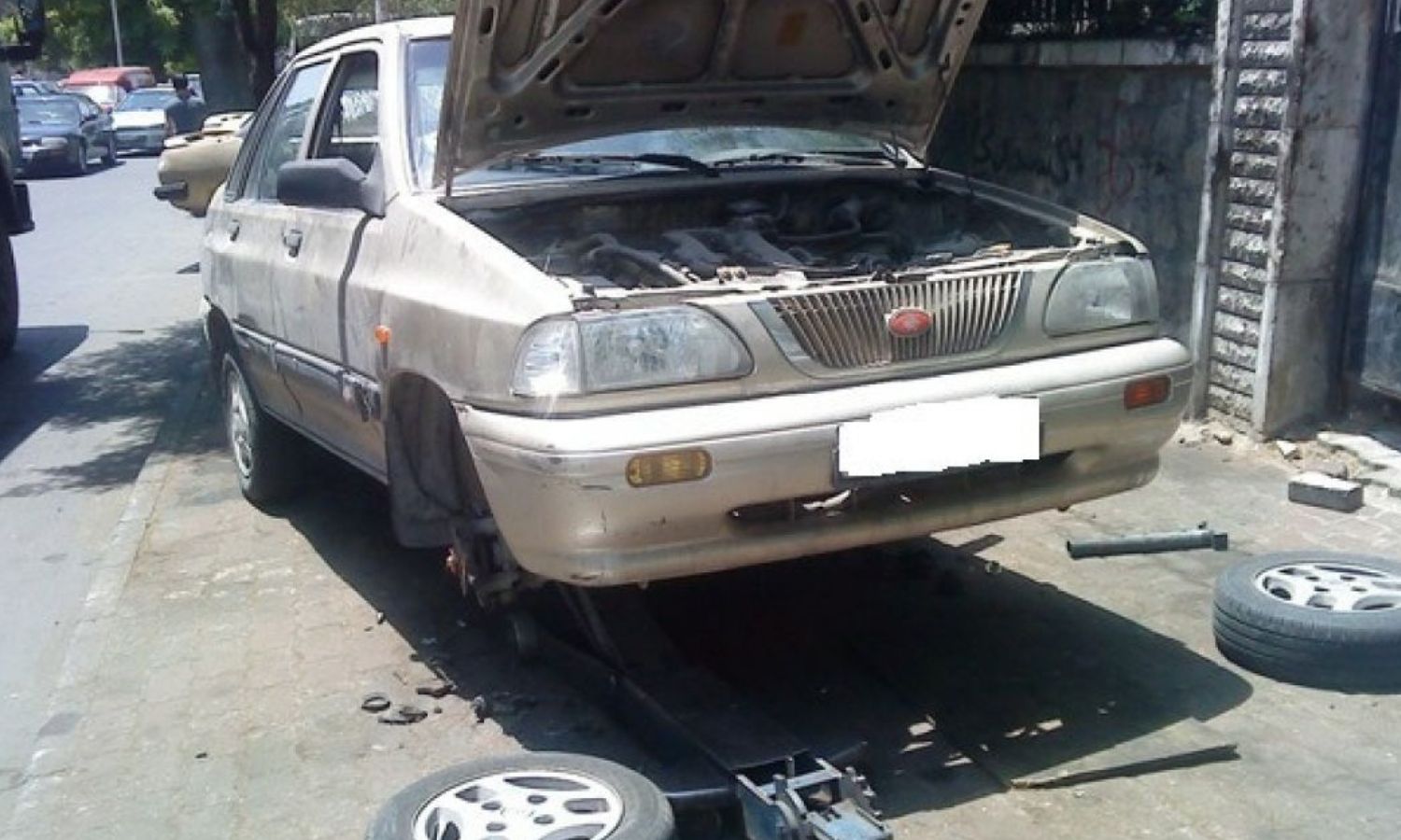 ورشة لإصلاح السيارات في دمشق (وكالة قاسيون)