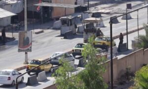 حاجز عسكري للفرقة الرابعة على مدخل حي الشيخ مقصود في حلب- 24 تشرين الثاني 2022 (وكالة هاوار)
