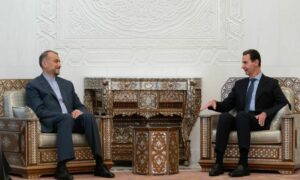 رئيس النظام السوري بشار الأسد ووزير الخارجية الإيراني أمير عبد اللهيان خلال زيارة الأخير لدمشق- 14 كانون الثاني 2023 (سانا)