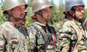 قوات النظام السوري خلال الاحتفال بذكرى تأسيس الجيش-1 آب 2022 (سانا)
