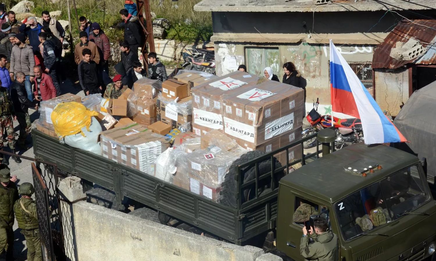 القوات الروسية توزع مساعدات إغاثية في ريف اللاذقية- 17 من شباط 2023 (سبوتنك)
