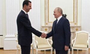 الرئيس الروسي فلاديمير بوتين يلتقي بالرئيس السوري بشار الأسد في الكرملين- 13 من أيلول 2021 (GettyImages)

