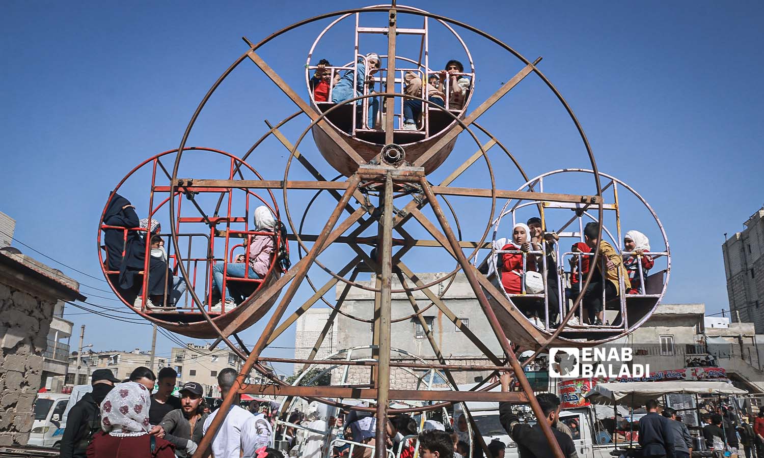 الأطفال يحتفلون بعيد  الفطر في مدينة إدلب - 23 من نيسان 2023 (عنب بلدي/ أنس الخولي)