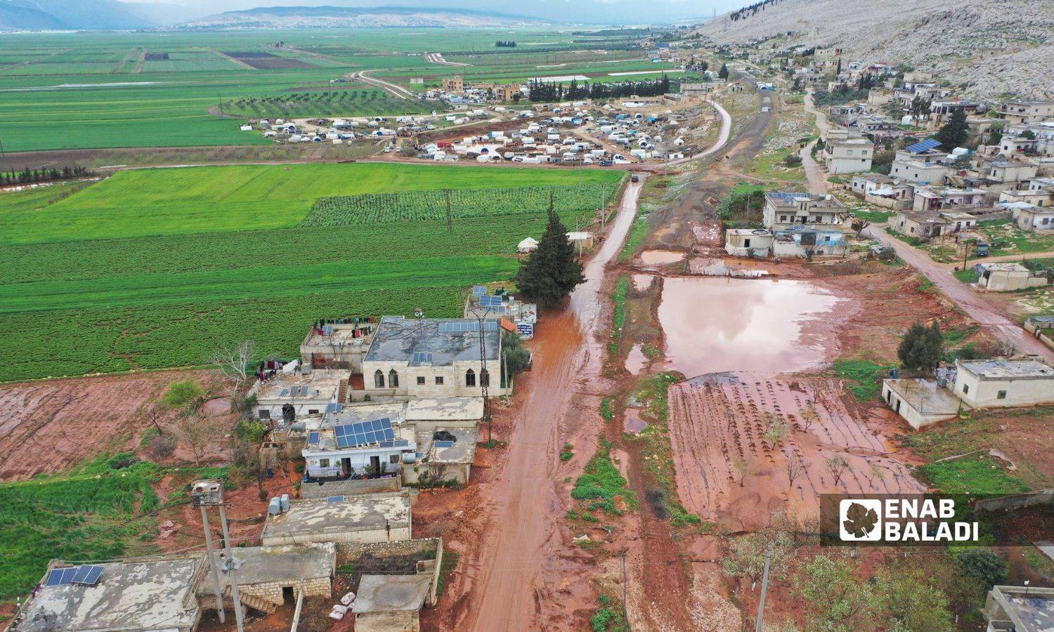 أضرار الهطولات المطرية المتأخرة على الأراضي الزراعية شمال غربي سوريا- 20 من آذار 2023 (الدفاع المدني السوري/ فيس بوك)