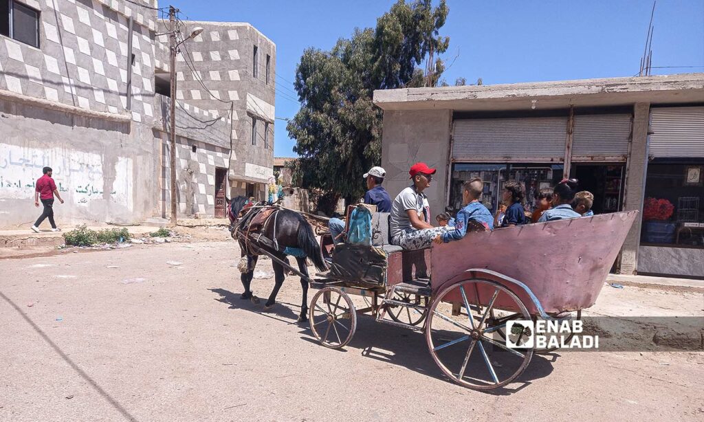 الاطفال في بلدة المزيريب يحتفلون في عيد الأضحى بريف درعا الغربي - 28 يوليو 2023 (عنب بلدي - حليم محمد)