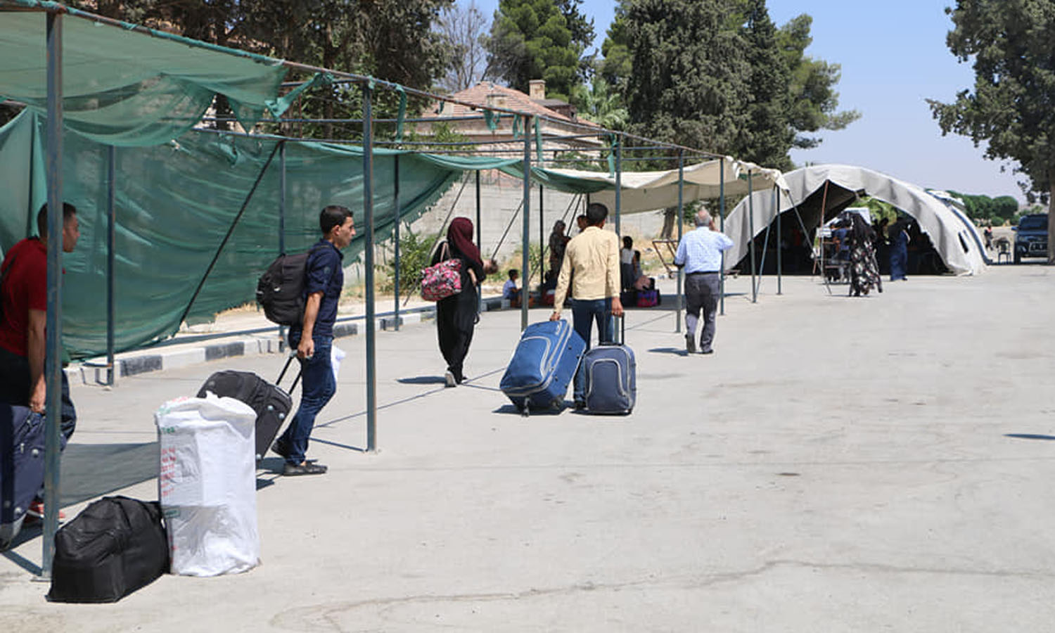 منذ عدة سنوات يعبر السوريون من تركيا باتجاه الأراضي السورية لقضاء إجازة العيد مع ذويهم شمالي حلب- 23 تموز 2019 (معبر جرابلس/ فيس بوك)