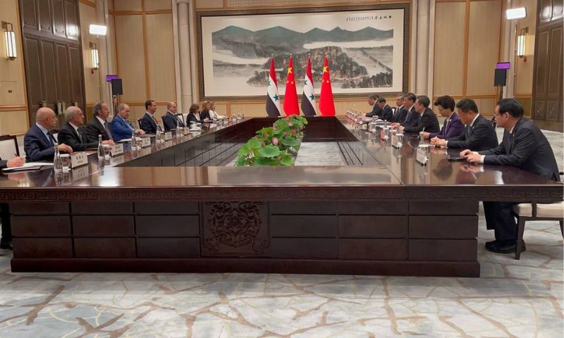 لقاء ثنائي بين رئيس النظام السوري بشار الأسد والرئيس الصيني شي جين بينغ في مدينة هانغتشو الصينية- 22 أيلول 2023 (وكالة شينخوا)