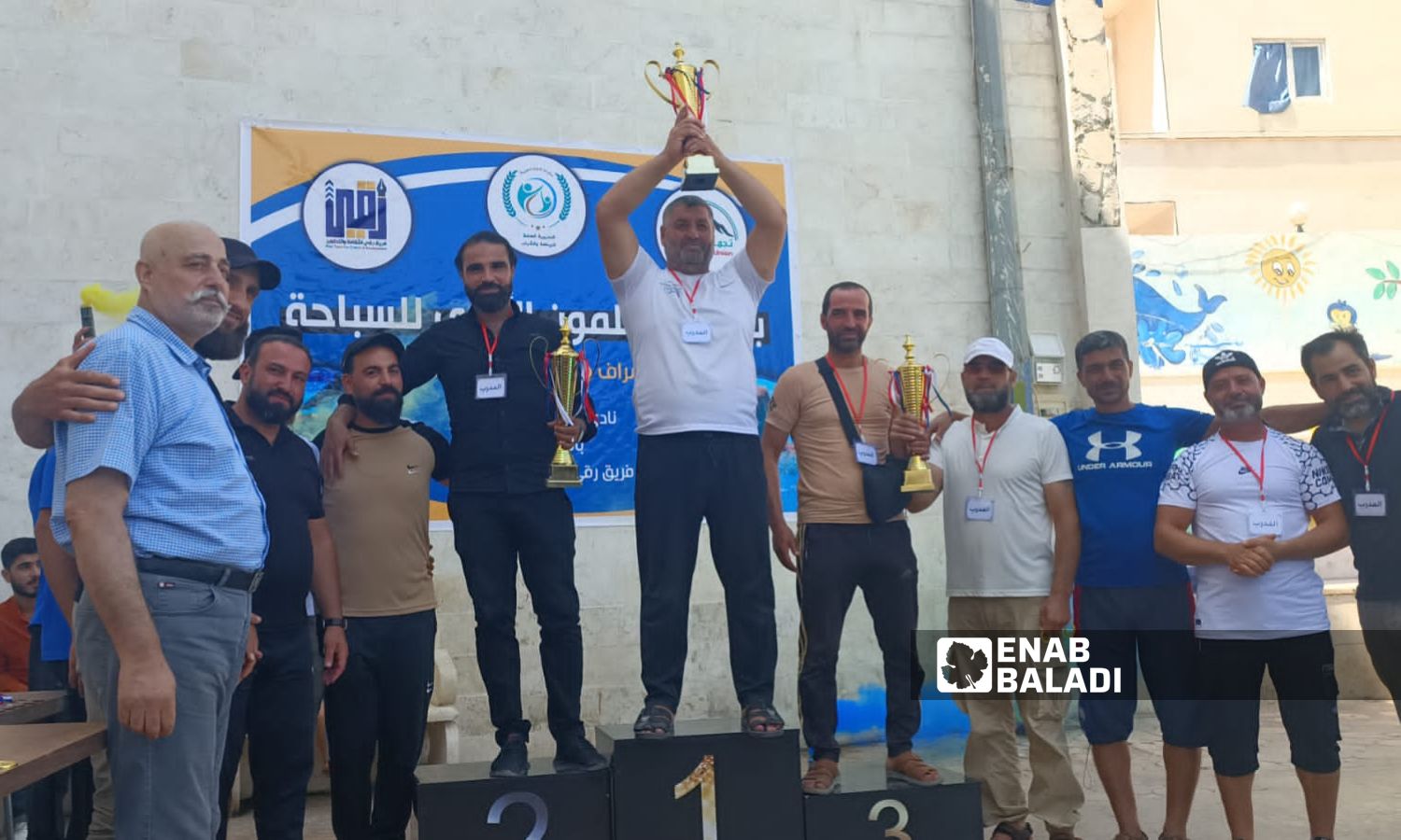 تتويج الفائزين في بطولة "القلمون" الأولى للسباحة في إدلب- 3 من أيلول 2023 (عنب بلدي/ أنس الخولي)