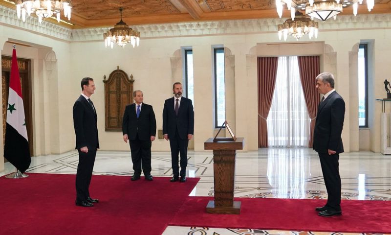 سفير النظام السوري إلى الصين، محمد حسنين خدام، يؤدي اليمين الدستورية- 10 من أيار 2022 (سانا)