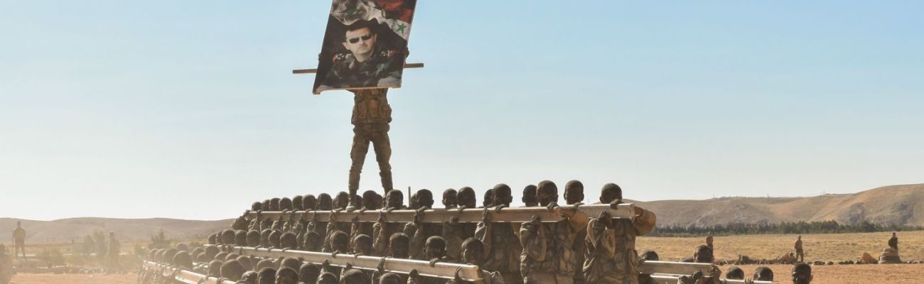 مقاتلون في صفوف النظام السوري خلال تخريج دورة "طلاب ضباط"- 15 تموز 2023 (وزارة الدفاع)
