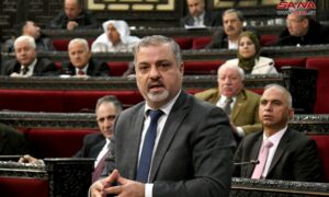 وزير المالية في حكومة النظام السوري كنان ياغي خلال جلسة 