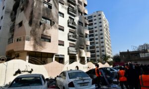 مبنى استهدفته طائرات إسرائيلية في حي كفرسوسة بالعاصمة السورية دمشق- 21 من شباط 2024 (سانا)