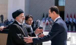 من لقاء الأسد مع رئيسي في دمشق- 3 من أيار 2023 (الشرق الأوسط)