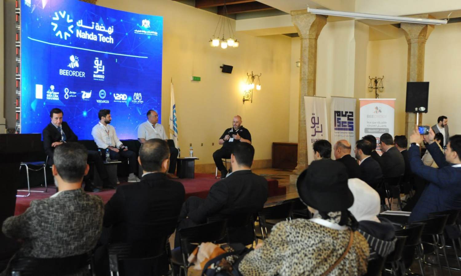 جانب من الحضور في مؤتمر "نهضة تك" في دمشق الذي شهد إطلاق منصة "هدهد"- 10 من أيار 2025 (سانا)