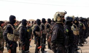 عناصر تتبع لـ"قوات سوريا الديمقراطية" (قسد) خلال استعراض عسكري 21 شباط 2025 (قسد/ المركز الإعلامي)