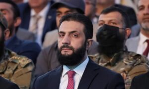 أحمد الشرع في احتفال بتحرير سوريا في حلب، سوريا، 24 من أيار 2025 . ( رويترز/خليل العشاوي)