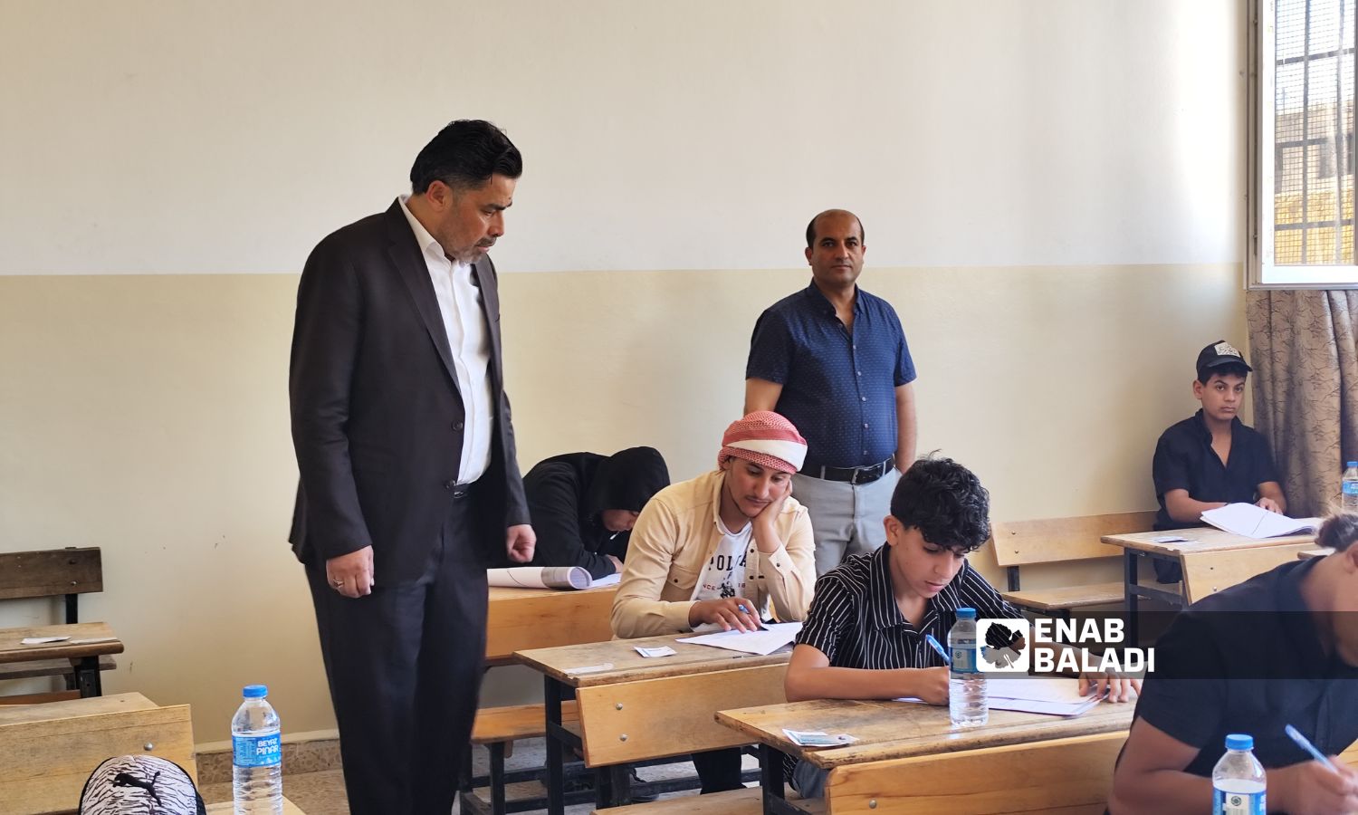 توزع الطلاب على مراكز امتحانية مجهزة بالتنسيق بين الوزارة ومديريات التربية والتعليم في المدينتين - 21 حزيران 2025 (عنب بلدي)