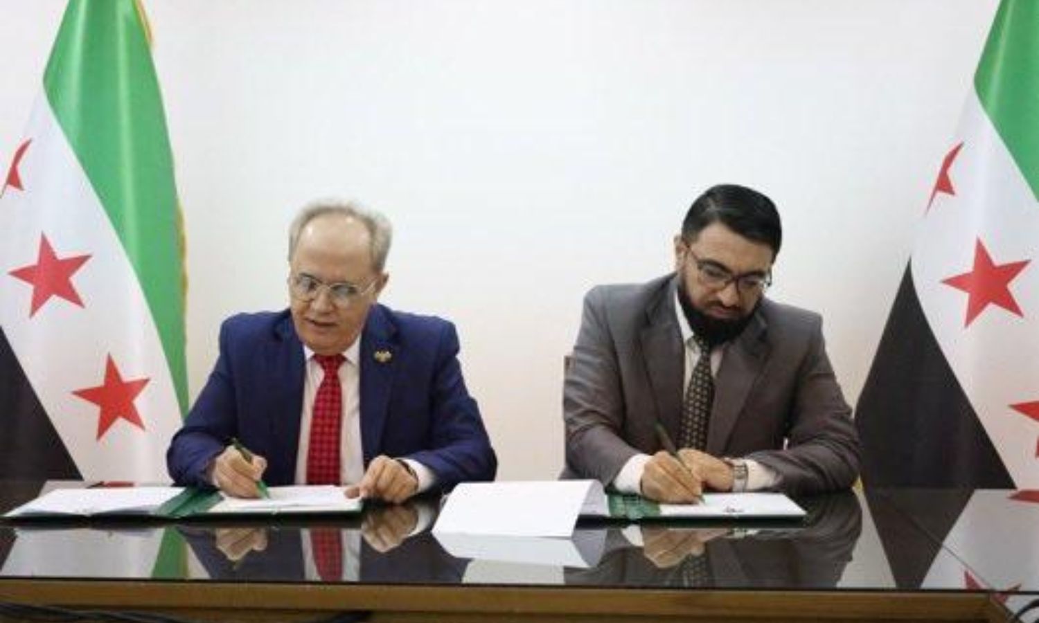 اتفاقية بين وزارة التعليم العالي والبحث العلمي ووزارة العدل لفتح فرص الماجستير لقضاة وخريجي المعهد العالي للقضاء - 29 من تموز 2025 (مظهر الويس/ إكس)