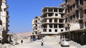 مبانٍ مدمرة في ضواحي دمشق - 31 آب 2025 (كيودو)