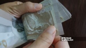 عملة نقدية من فئة 5 آلاف ليرة سورية (عنب بلدي)