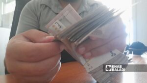 عملة نقدية من فئة 5 آلاف ليرة سورية (عنب بلدي)