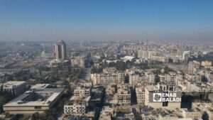 صورة جوية لمدينة حلب تظهر مبنى المحافظة وعددًا من الأحياء المدينة - 3 كانون الأول 2024 (عنب بلدي)