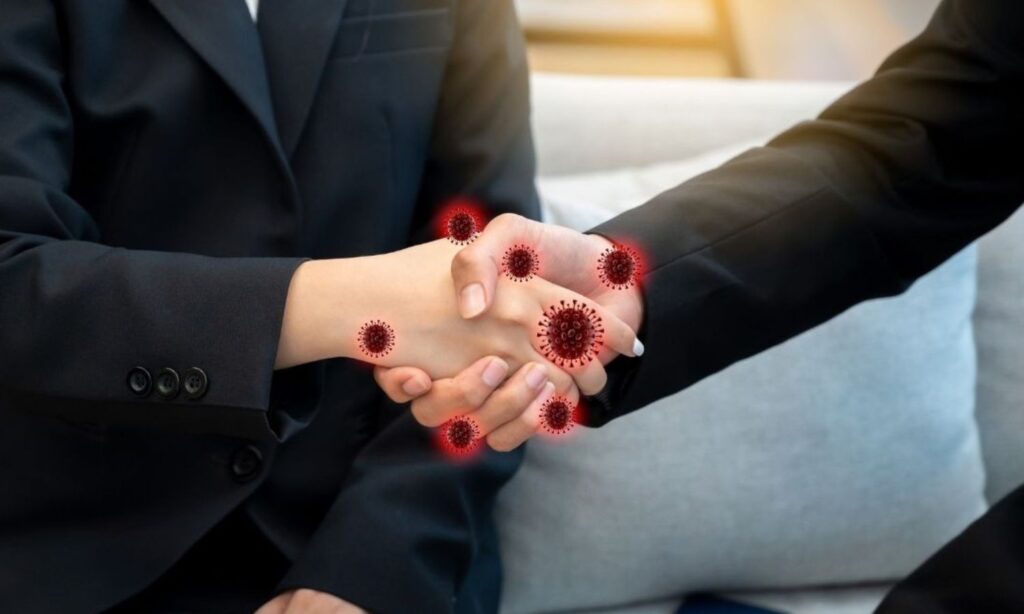 صورة تعبيرية عن انتقال متحور نيمبوس عبر التصافح بالأيدي (كانفا)