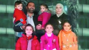 الطبيبة السورية رانيا العباسي وعائلتها (منظمة العفو الدولية)