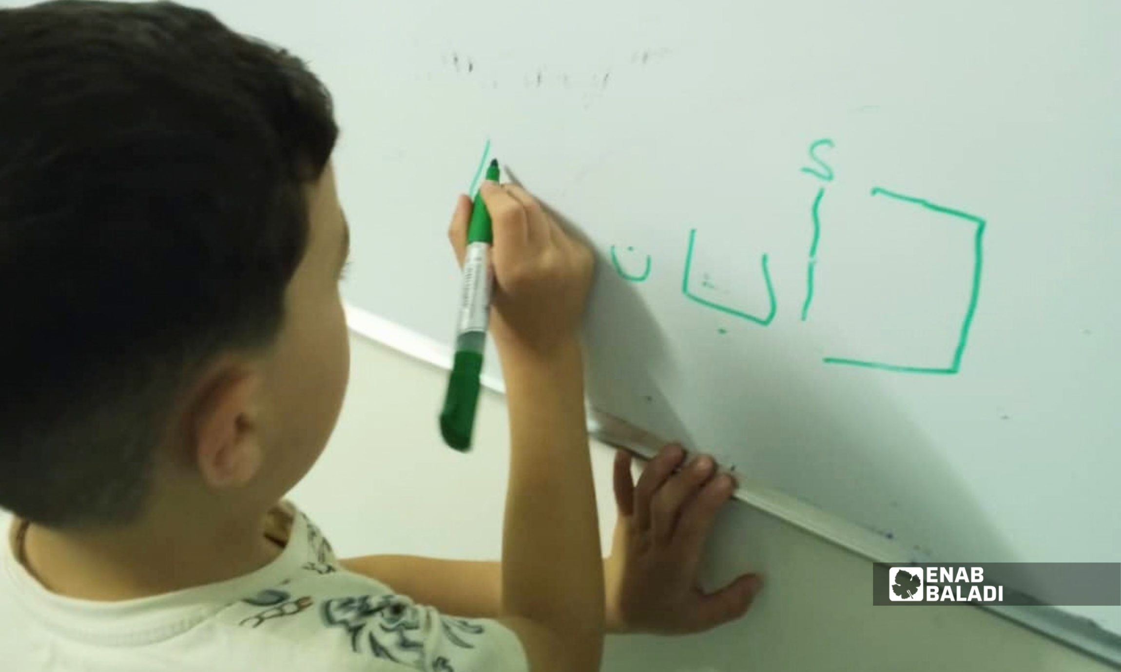 أطفال يشاركون في أحد الأنشطة ضمن دورة صيفية في داريا