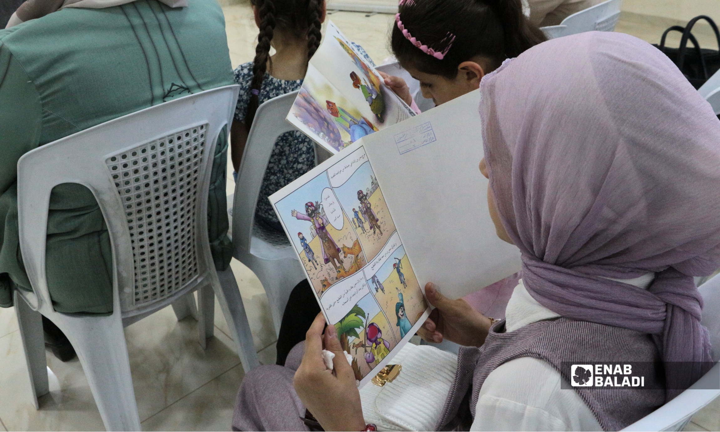حضور مشاركين خلال ورشة القراءة السريعة في المركز الثقافي بمدينة داريا