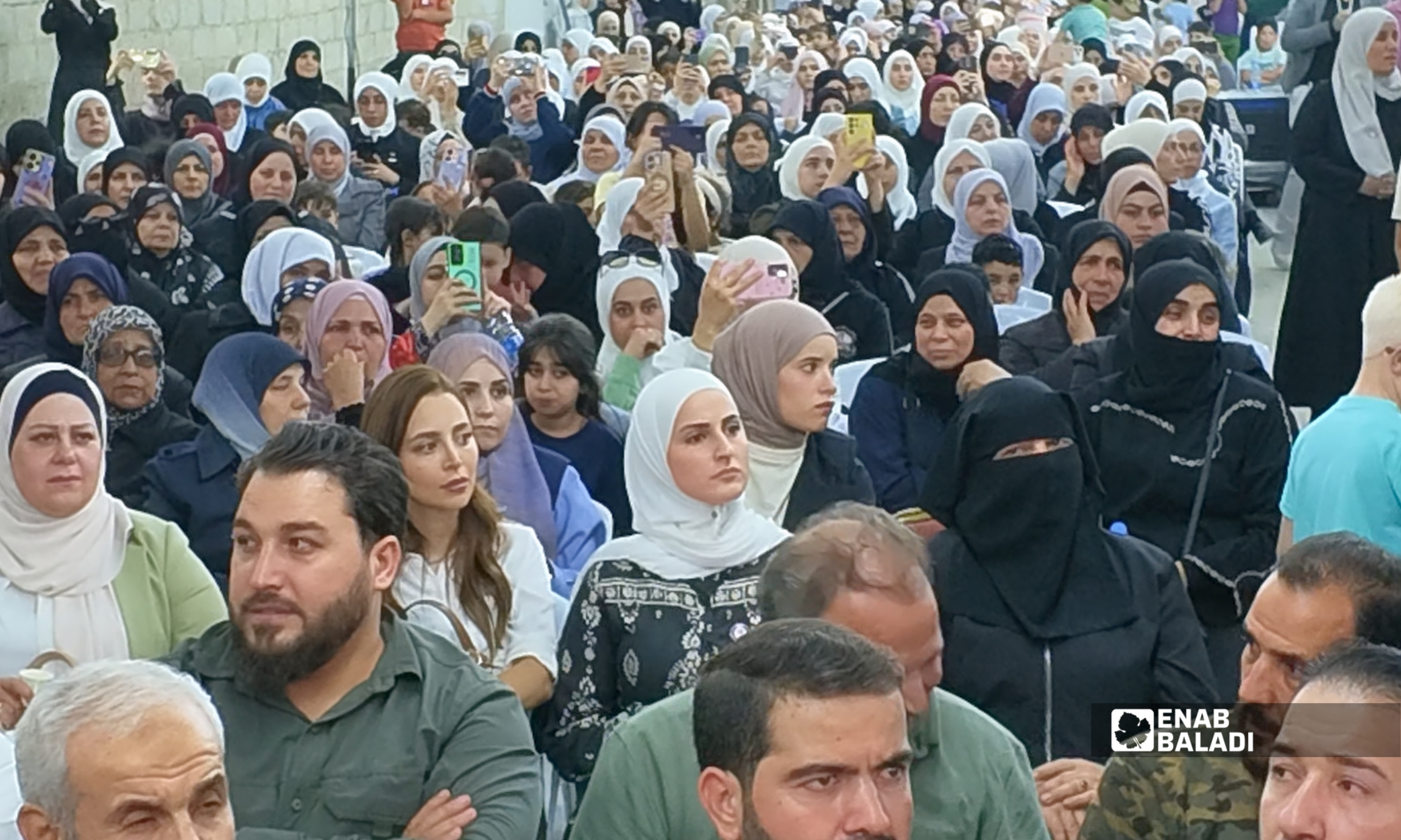 جانب من الفعالية الأهلية لإحياء الذكرى الرابعة عشرة لمجزرة داريا 