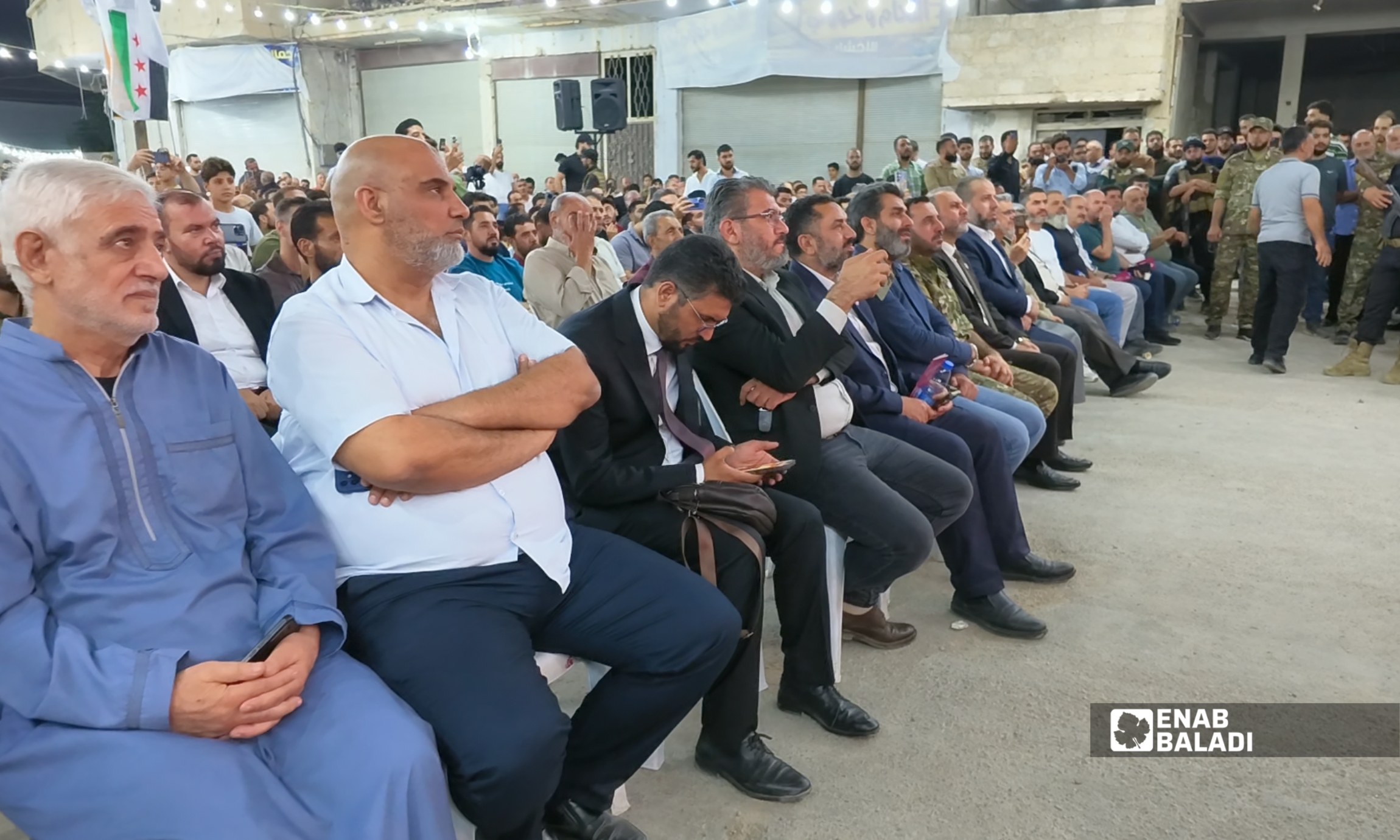 جانب من الفعالية الأهلية لإحياء الذكرى الرابعة عشرة لمجزرة داريا 