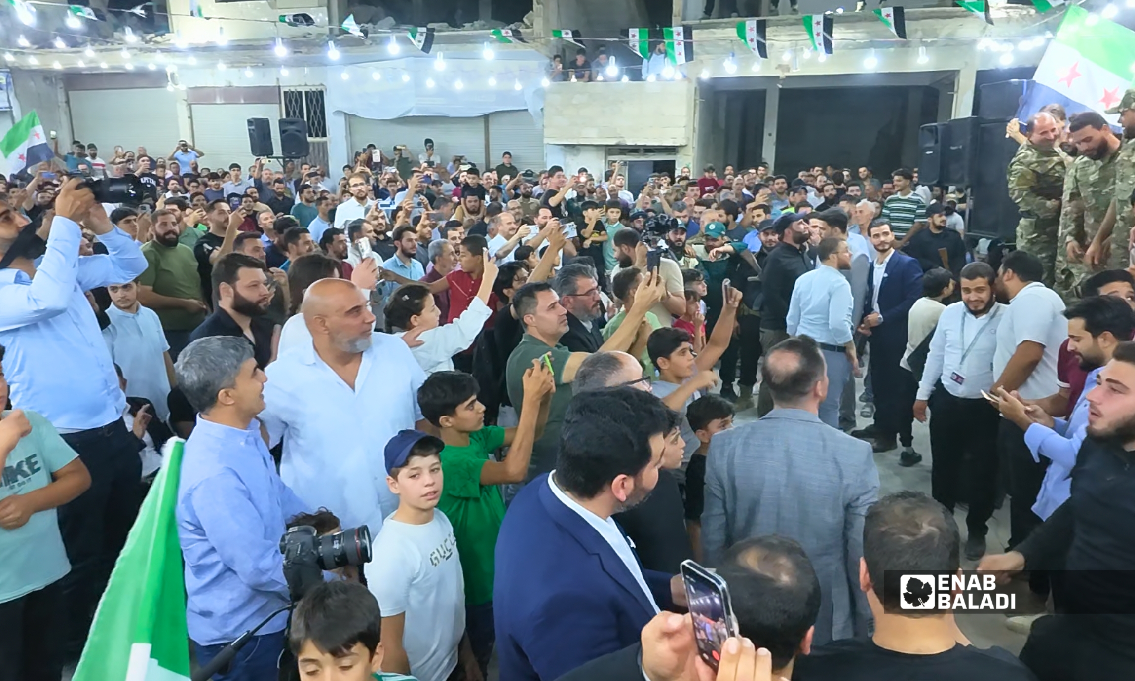 جانب من الفعالية الأهلية لإحياء الذكرى الرابعة عشرة لمجزرة داريا 