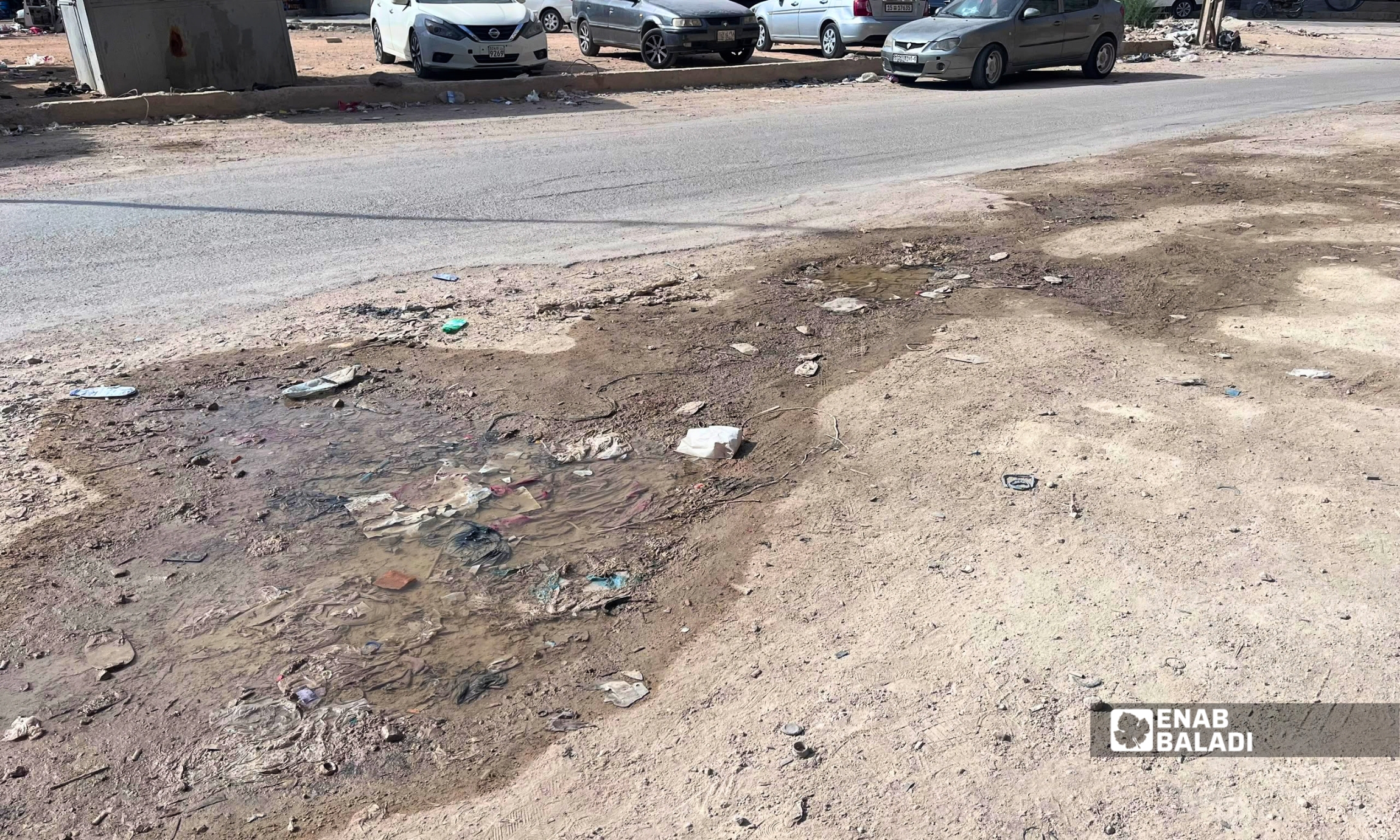 مياه متجمعة أمام محال تجارية في أحد شوارع داريا 