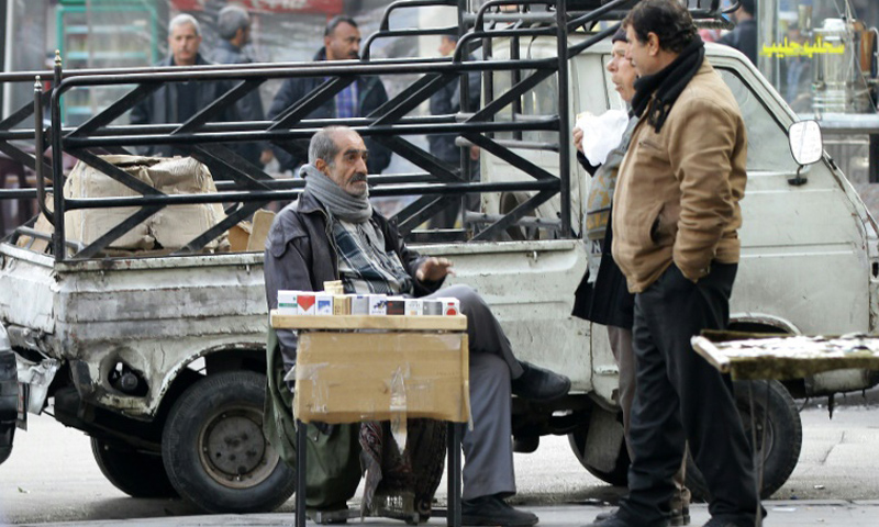 Cigarette seller, Damascus, 17 December 2016 (AFP)