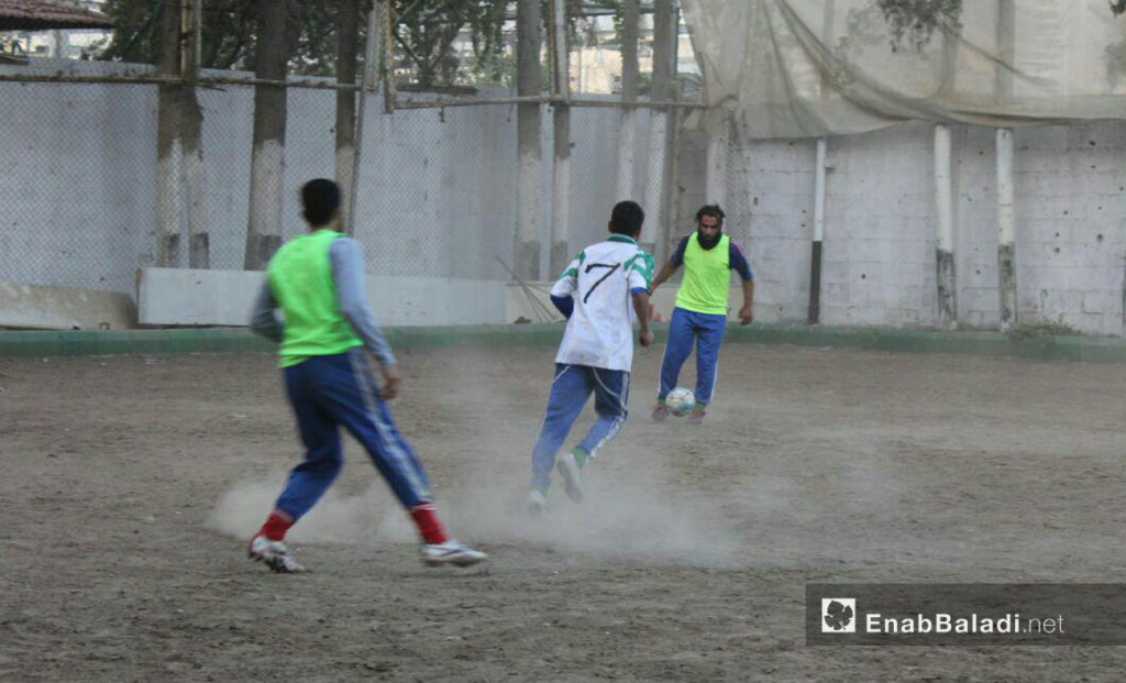 Players in al-Jaysh football club in eastern Ghouta, Damascus, during training, November 2016 (Enab Baladi)