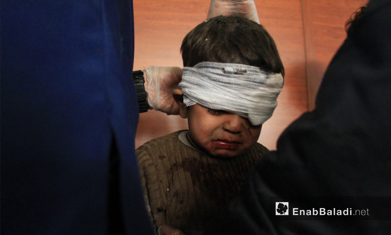 Child injured in the artillery shelling on the outskirts of Hamouriyah in Eastern Ghouta - 13 December 2017 (Enab Baladi)