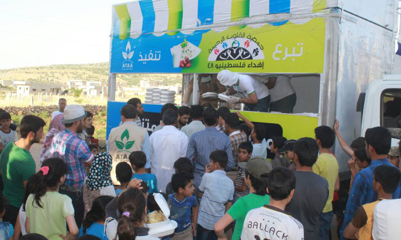 "Ataa" Association for Humanitarian Relief utilizes nontraditional means, a mobile kitchen, to reach fasting people in remote areas in northern Syria.