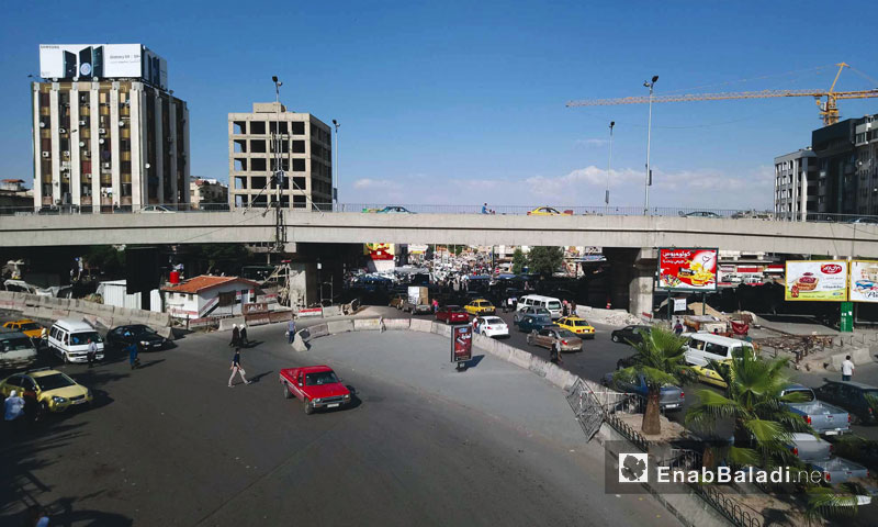 Concrete roadblock of a barrier in al-Thawra Street, the capital Damascus - June 6, 2018 (Enab Baladi)