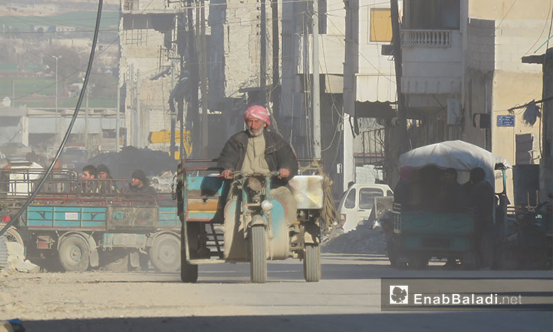 An old man driving a motorcycle in the city of al-Bab following its liberation – March 19, 2017 (Enab Baladi)