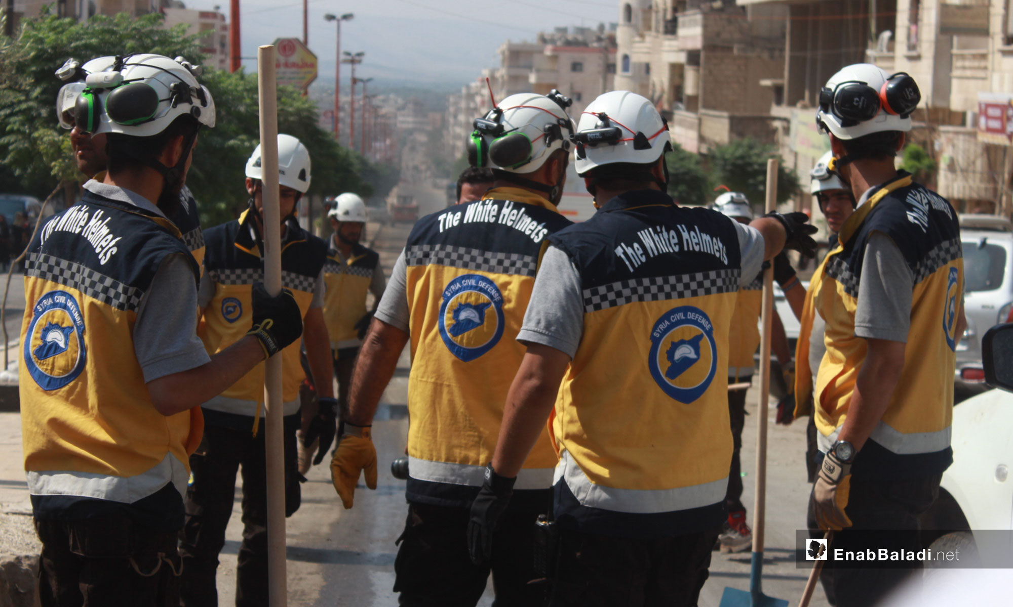   Civil Defense members in a campaign for the rehabilitation of roads in Afrin city – August 1, 2018 (Enab Baladi)