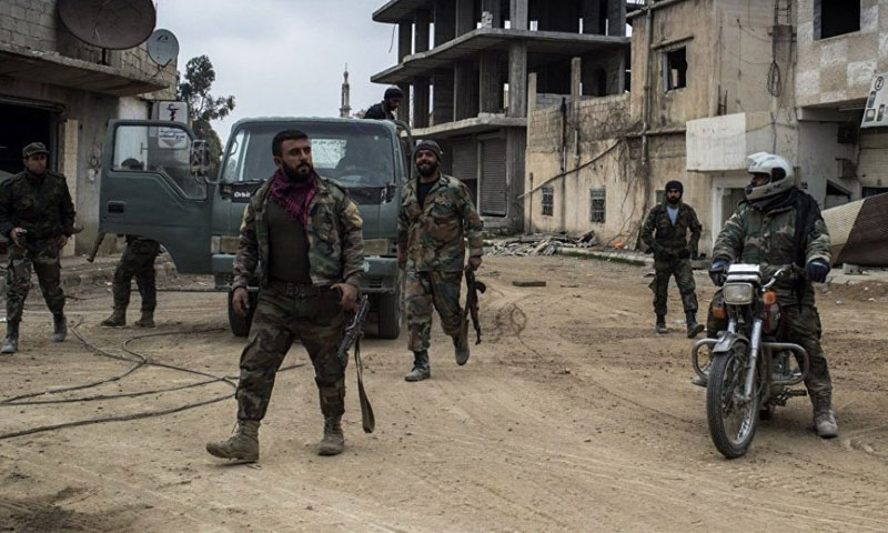 Assad’s forces troops in the Daraa city’s neighborhoods – (Internet)