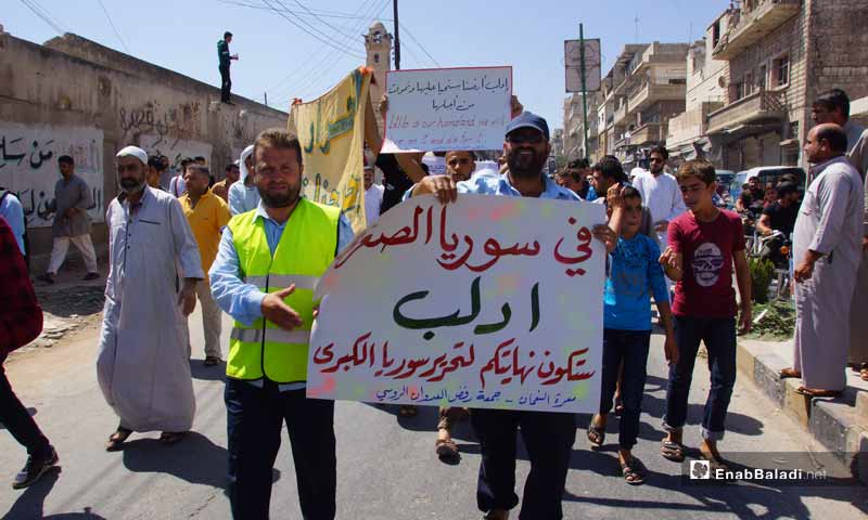 Caption: Demonstrations in Maarrat al-Nu'man objecting to the Russian intervention in Idlib – August 31, 2018 (Enab Baladi)