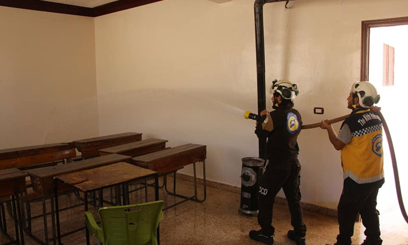 Members of the Syrian Civil Defense while rehabilitating one of Idlib city’s schools – September 2018 (Civil Defense Facebook Page)